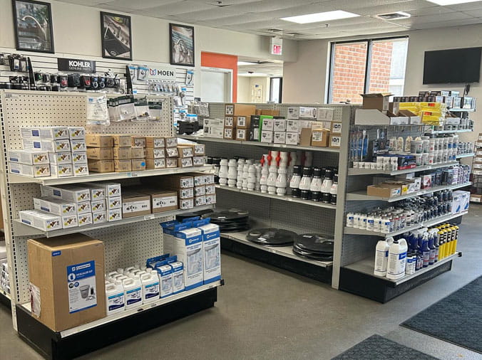 Stocked plumbing supply shelves at Crawford Supply Itasca IL