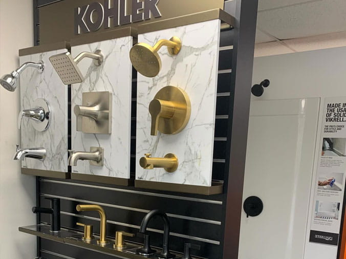 Kohler shower head display at Crawford Plumbing Supply Itasca IL